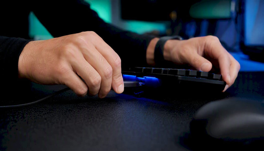 Hands connecting trading keypad cables