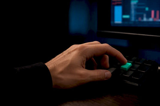 Trader configuring keypad controls at workstation